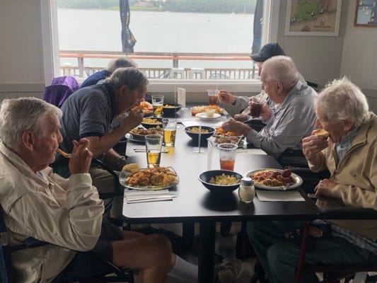 Residents enjoying a meal in a dining area