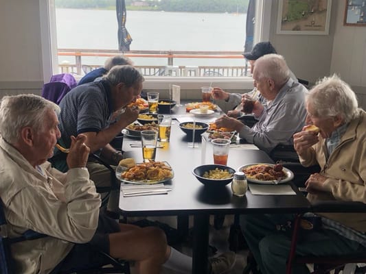 Residents enjoying a meal in a dining area