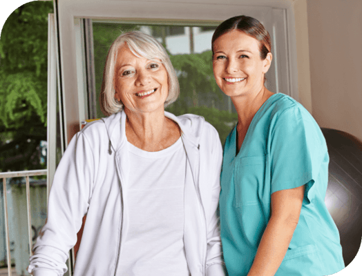 Staff member and resident smiling together