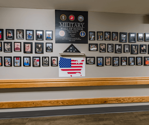 Military Wall of Honor in a facility hallway
