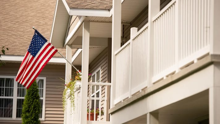 Close-up of a porch with an American flag