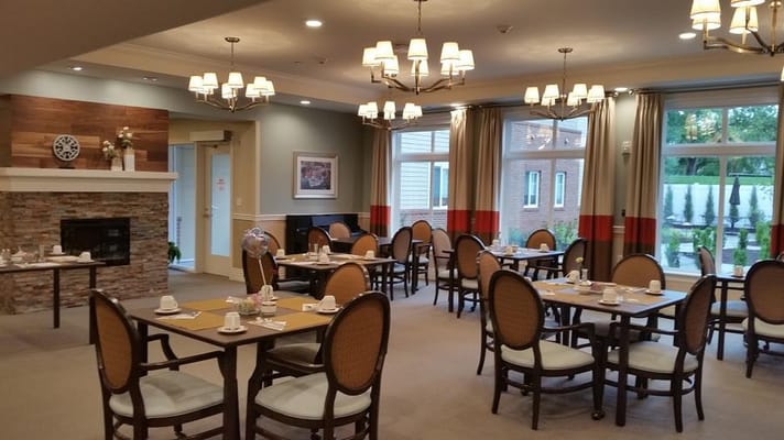 Interior dining room setup with tables and chairs