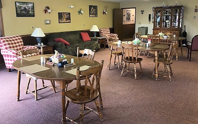 Interior view of a cozy common area with seating