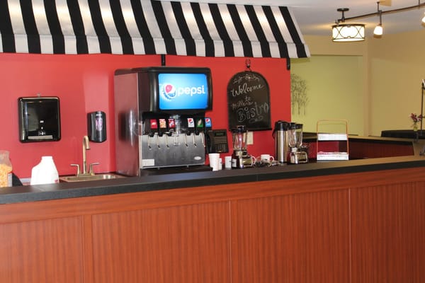 Inside view of a bistro area with beverage dispenser