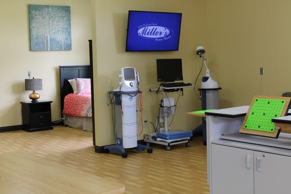 An interior view of a resident's room with medical equipment