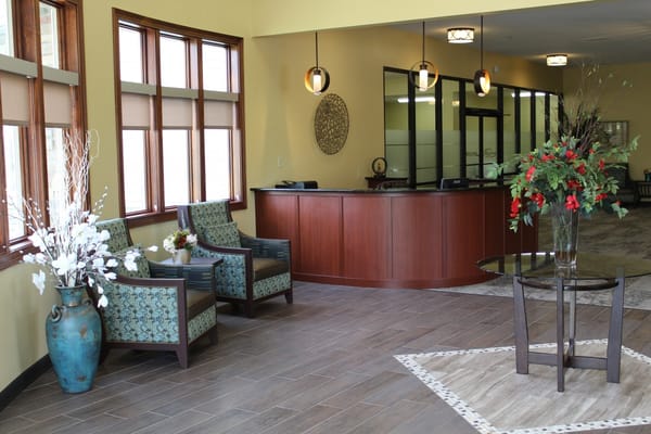 Bright and inviting lobby area with seating and decor