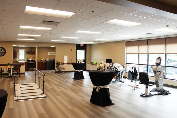 Interior view of a therapy room with rehabilitation equipment