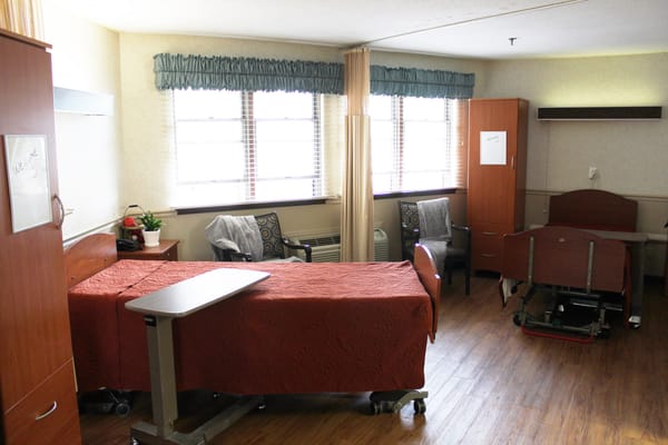 Interior view of a shared resident room with two beds