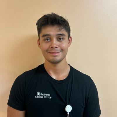 Staff member of Redbanks Colonial Terrace in a black shirt