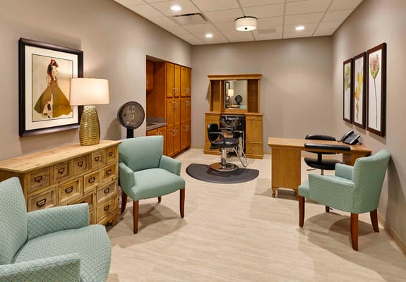 Brightly lit hair salon with modern furnishings