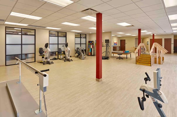 Interior view of a fitness area with exercise equipment
