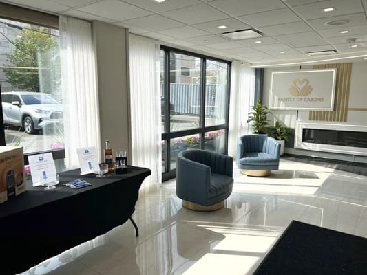 Interior view of a well-lit common area with seating