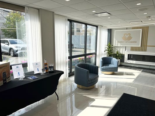 Interior view of a well-lit common area with seating