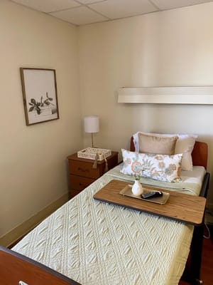 Cozy resident bedroom with decor and a bed