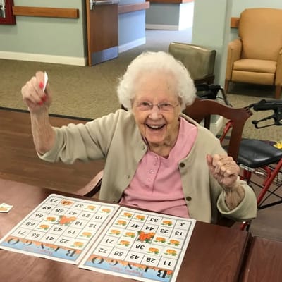 Resident joyfully celebrating a bingo win