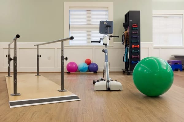 An interior view of a fitness area with equipment