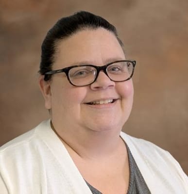 Woman smiling in a professional setting