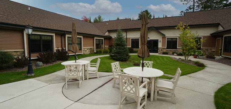 Outdoor courtyard with seating and landscaping