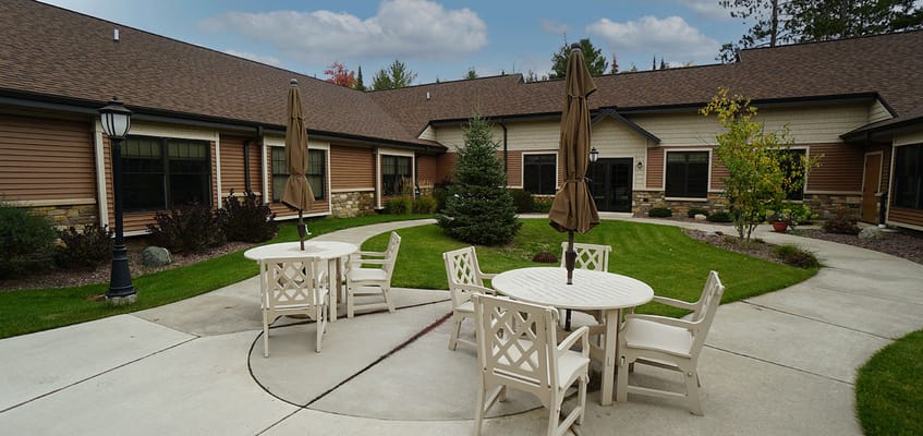 Outdoor courtyard with seating and landscaping