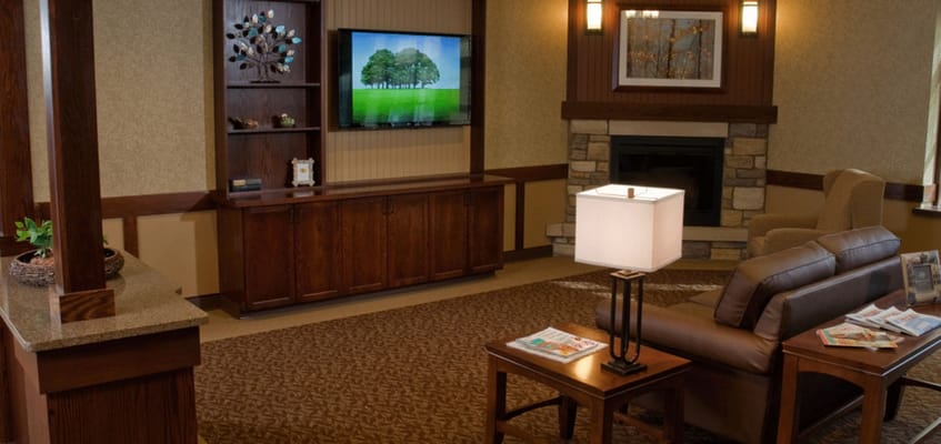 Cozy common area with comfortable seating and TV