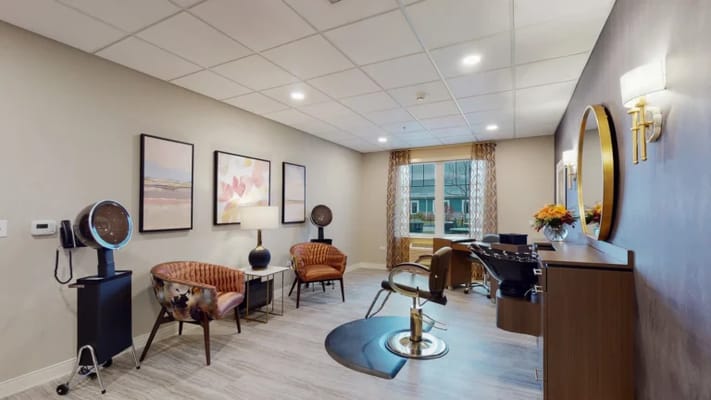 Bright beauty salon area with stylish seating