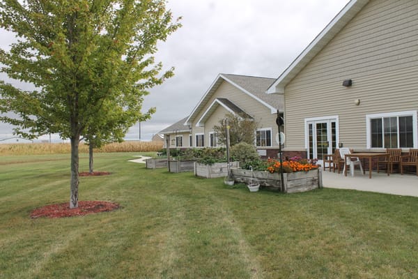 Outdoor space with gardens and facility building