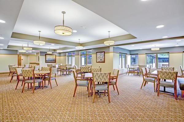 Dining room area with tables and chairs