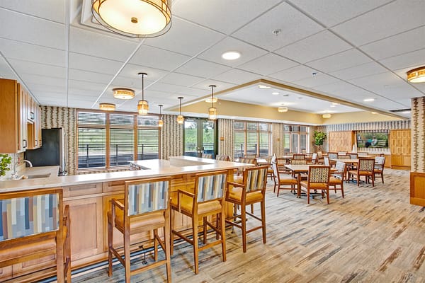A spacious common area with seating and natural light
