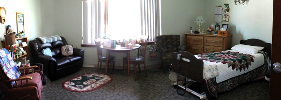 Interior view of a private resident room with furnishings