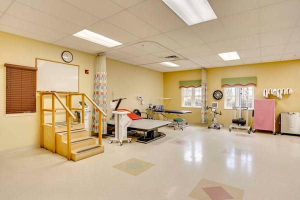 Interior view of a therapy room with equipment