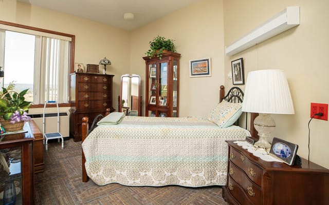 Cozy private resident room with warm decor