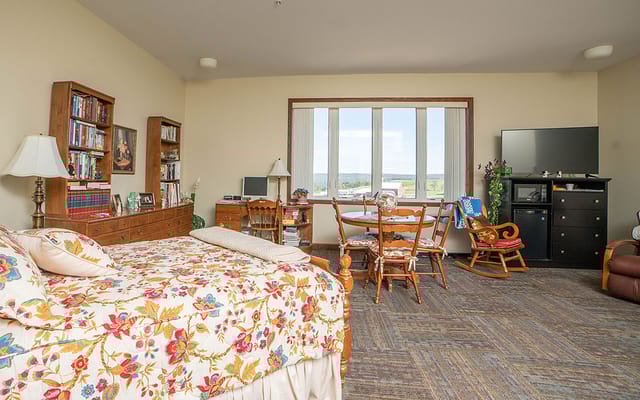 Cozy resident room with a view and furniture