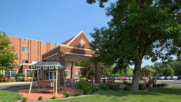 Exterior view of a senior living facility entrance