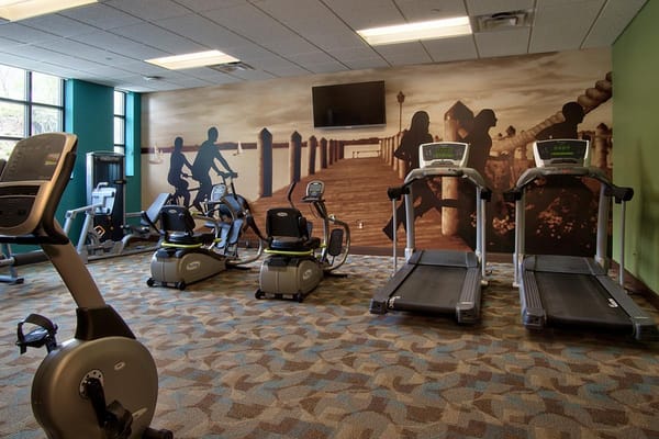 Interior view of a fitness room with exercise equipment