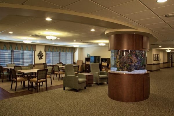 Common area with seating and an aquarium