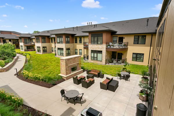 Outdoor courtyard with seating and landscaping