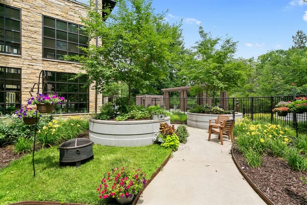Beautiful outdoor garden area with flowers and seating