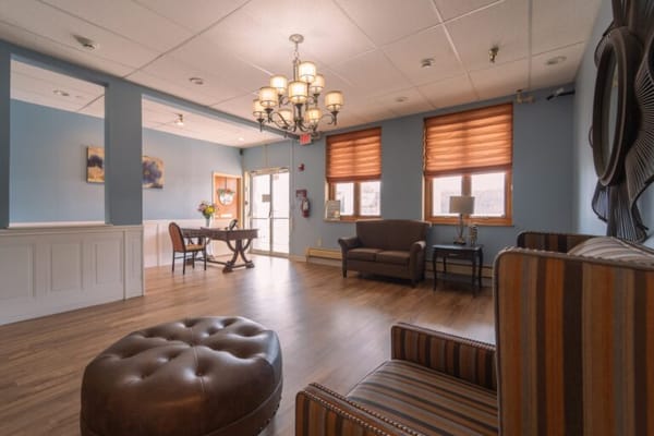 Bright common area with comfortable seating and decor