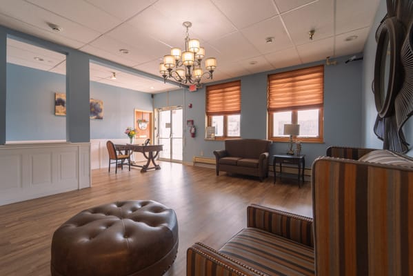 Bright common area with comfortable seating and decor