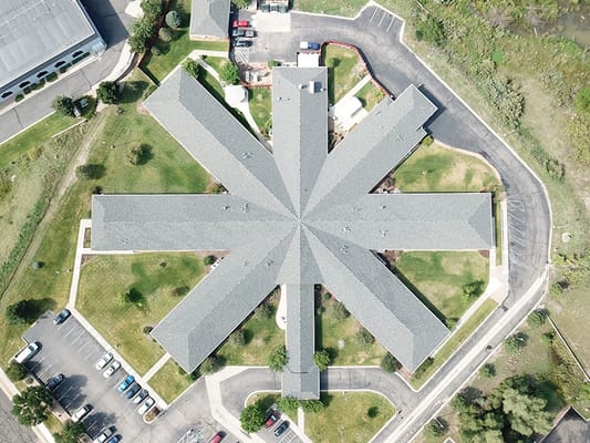 Aerial view of Brookside Inn facility with landscaped grounds