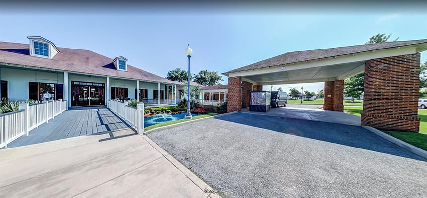 Front view of Camelot Brookside entrance and drive-through