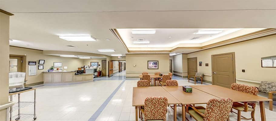 Interior view of a common area with dining tables
