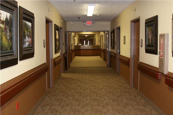 Interior hallway of a nursing home with artwork