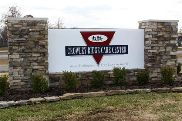 Sign for Crowley Ridge Care Center at the facility entrance