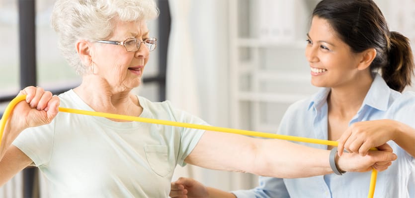 Resident participating in a physical therapy session