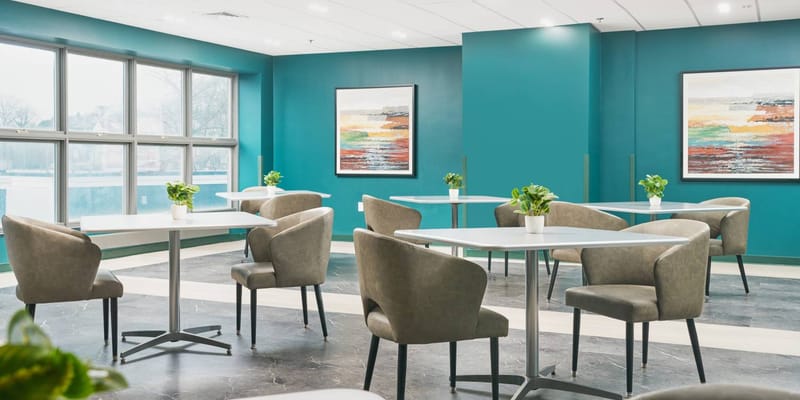 Modern dining area with tables and chairs