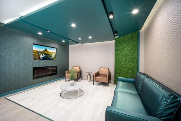 Modern common area with seating and TV