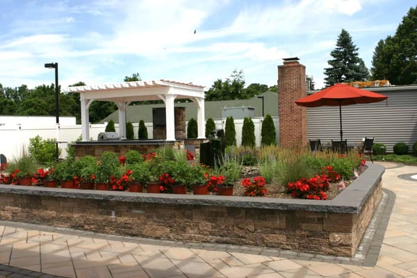 Outdoor garden area with a gazebo and seating