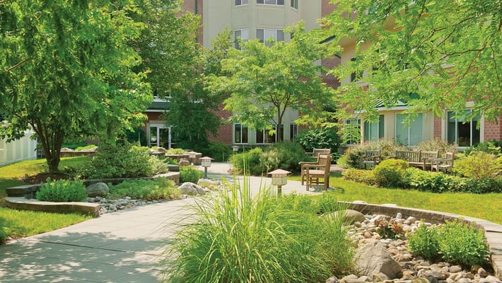 Beautifully landscaped outdoor space with seating