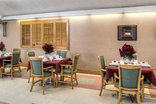 Dining area with tables set for guests
